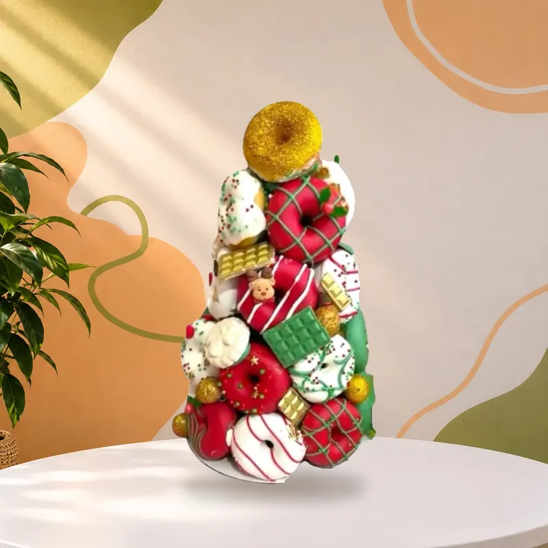 Torre navideña de galletas y postres decorados, armada para pedidos por cantidad